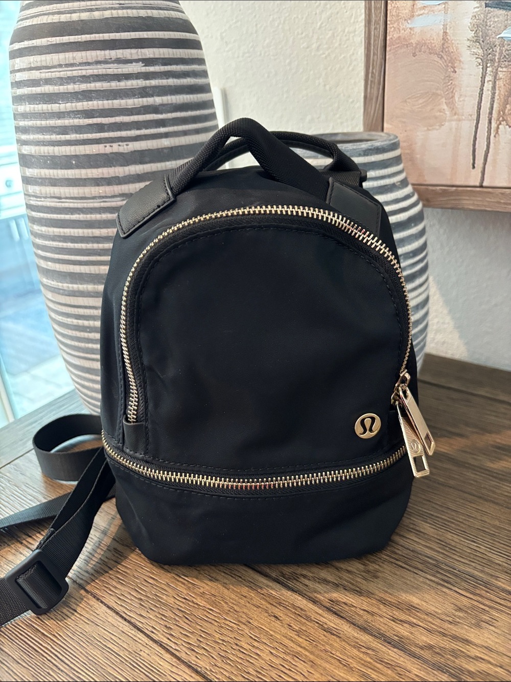 lululemon athletica Black Mini Backpack with Gold Hardware
